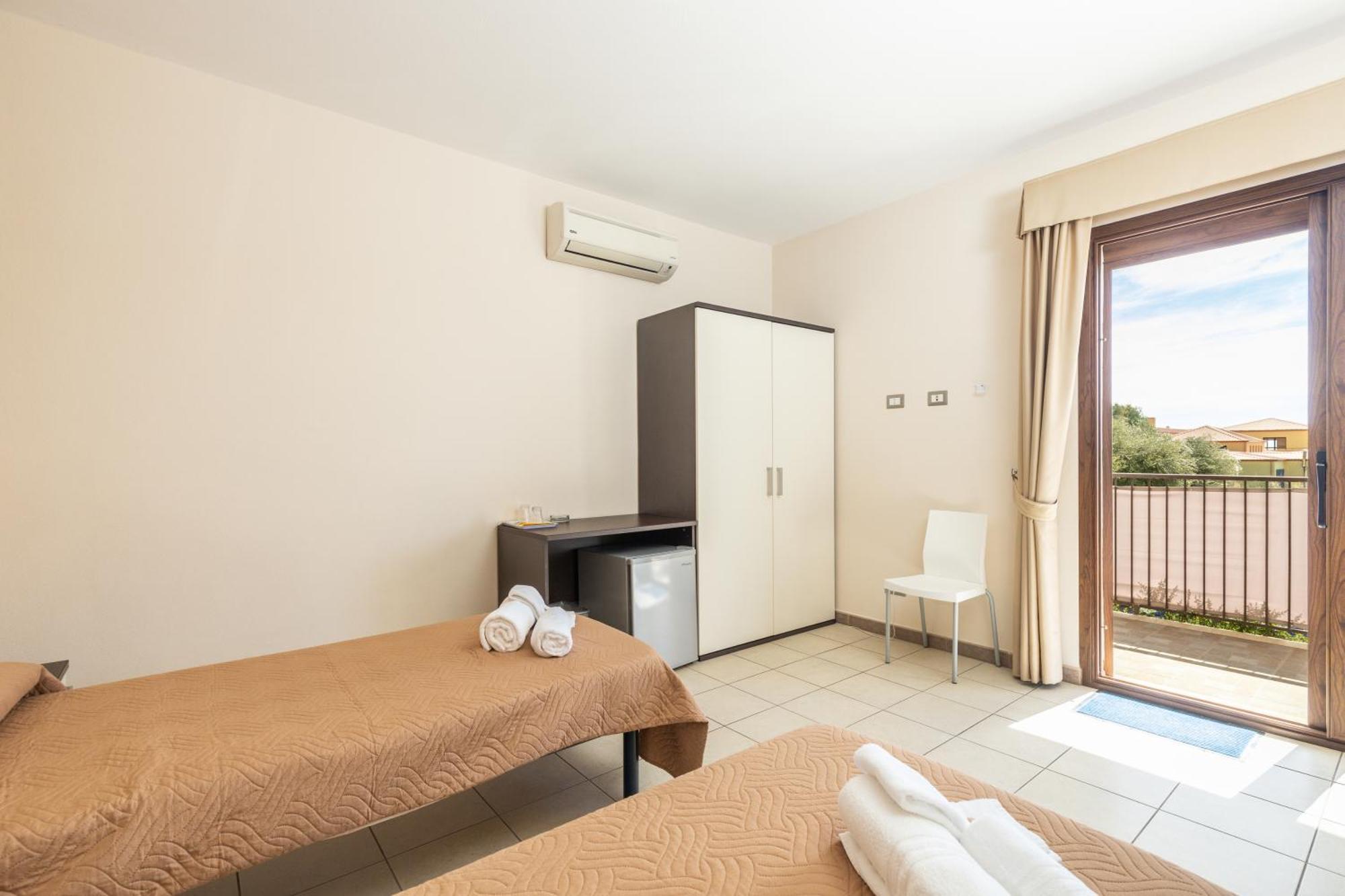 Dreibettzimmer mit Balkon